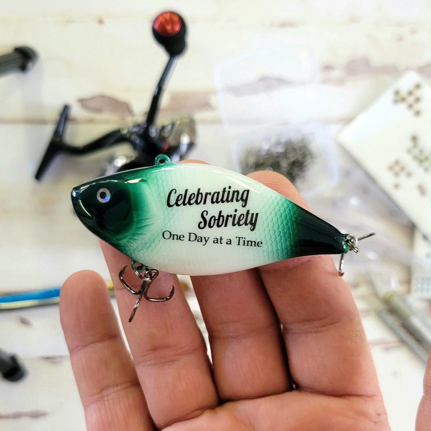 Custom AA recovery lure with inspirational message “One Day at a Time.”